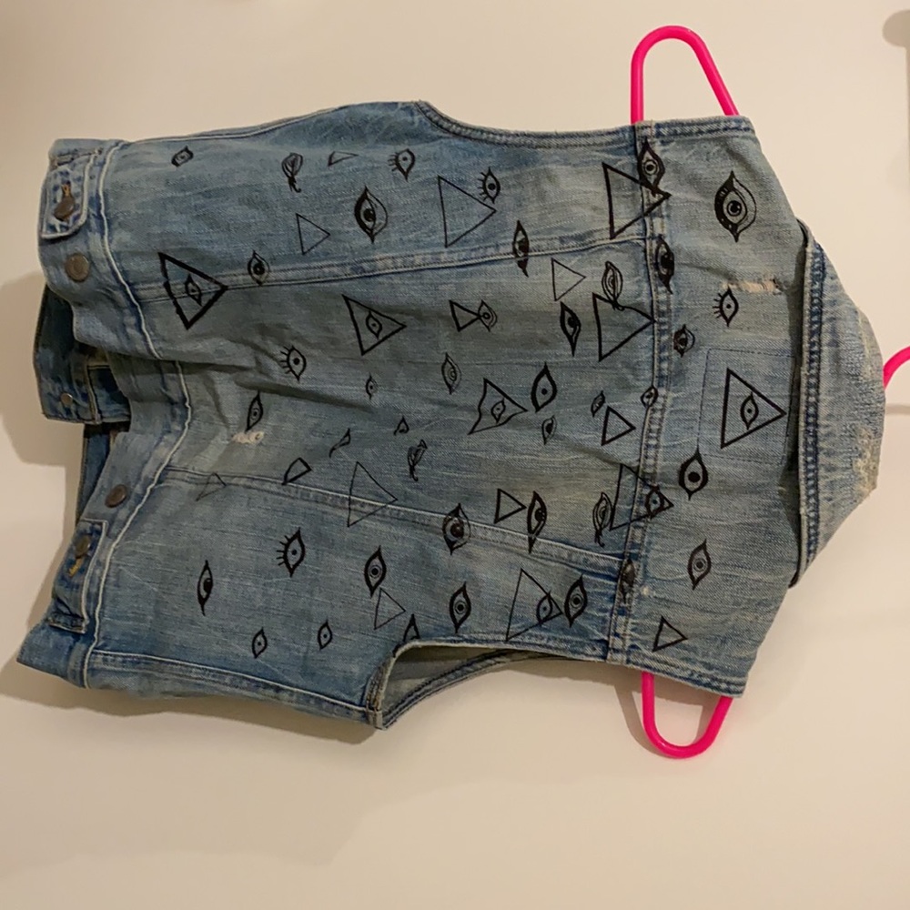 Levi denim vest with eye print on back